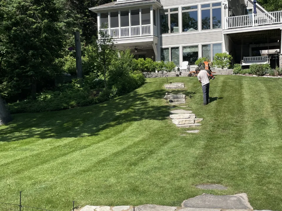 Lawn maintenance service creating a tidy, curb-ready yard in Sullivan, WI